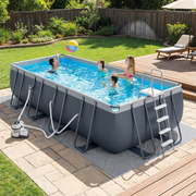 Rectangular above ground pool set with steel frame and sand filter pump in a backyard